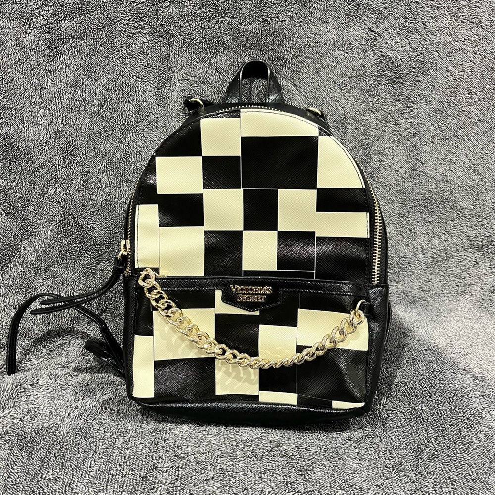 Victoria's Secret small city backpack with a black and white checkered pattern
